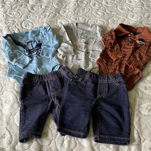 Carter’s Newborn Onesies w/2 pair of pants included